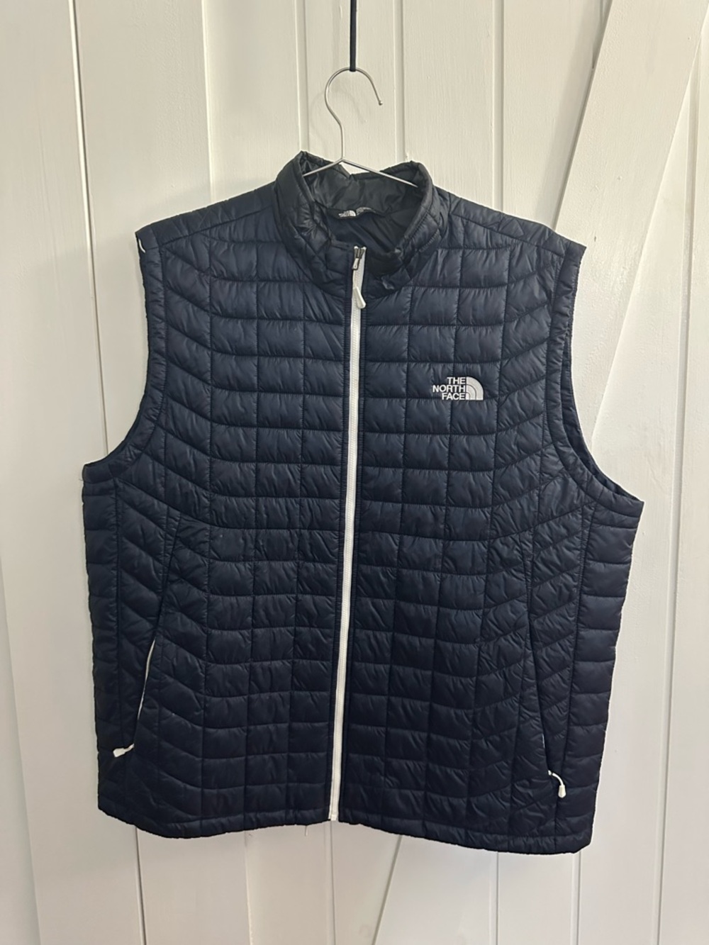 The North Face Men's Navy Black Quilted Vest with White Zip Trim